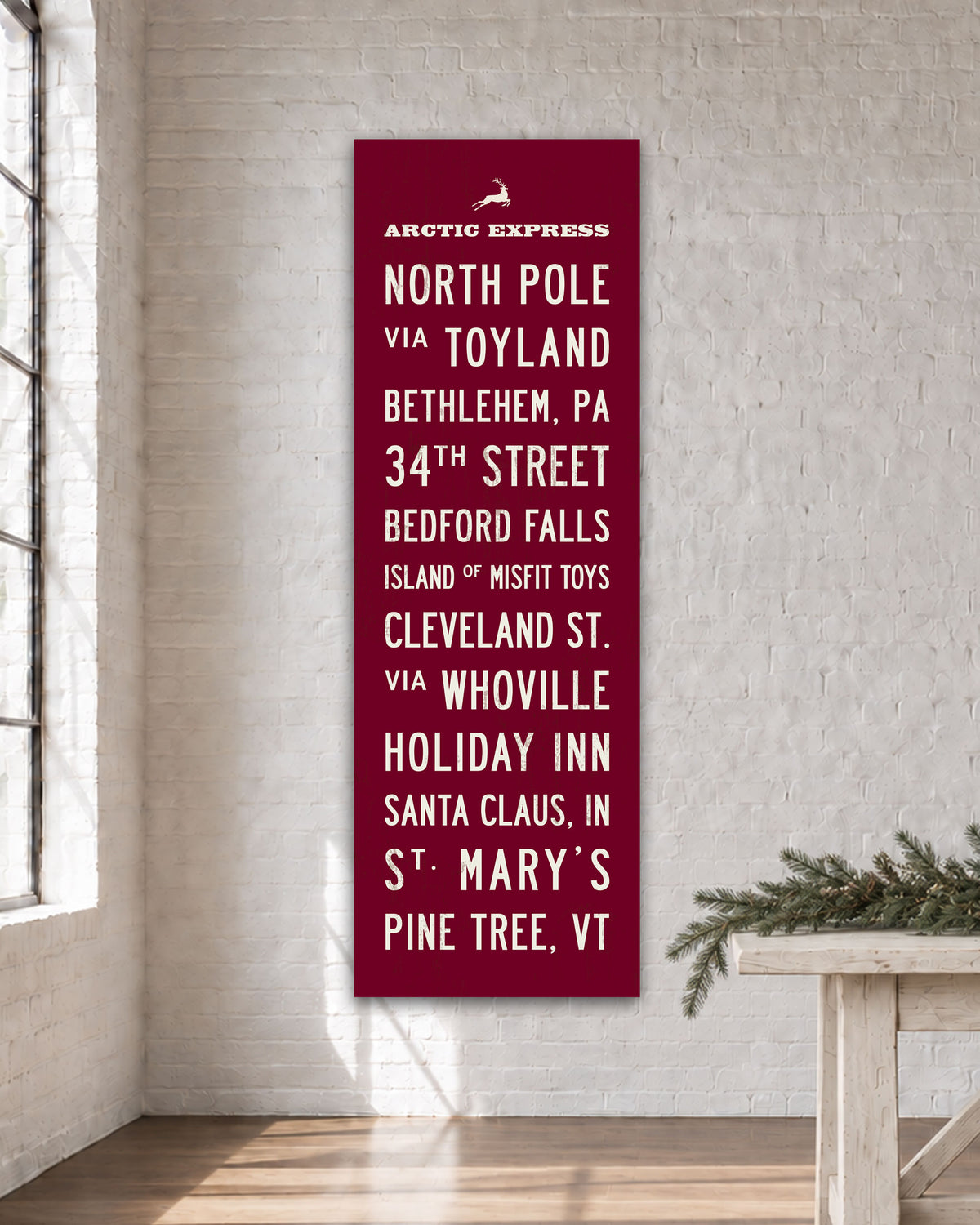 Christmas Subway Sign Hanging in simple room