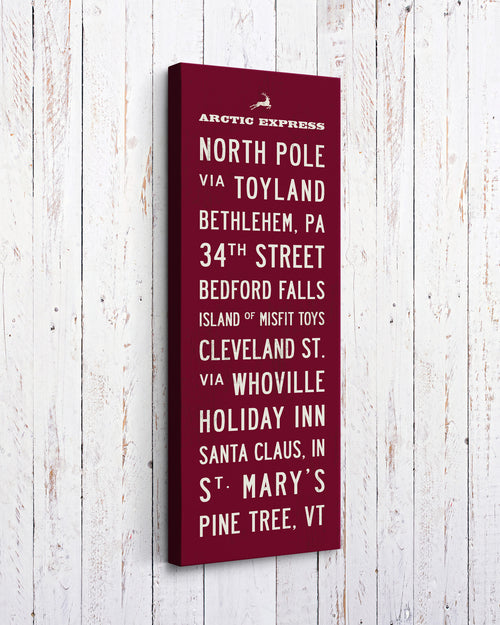 Red Christmas Subway Sign Hanging on white wood wall