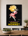 Cognac Monnet Poster by Cappiello hanging in a dining room