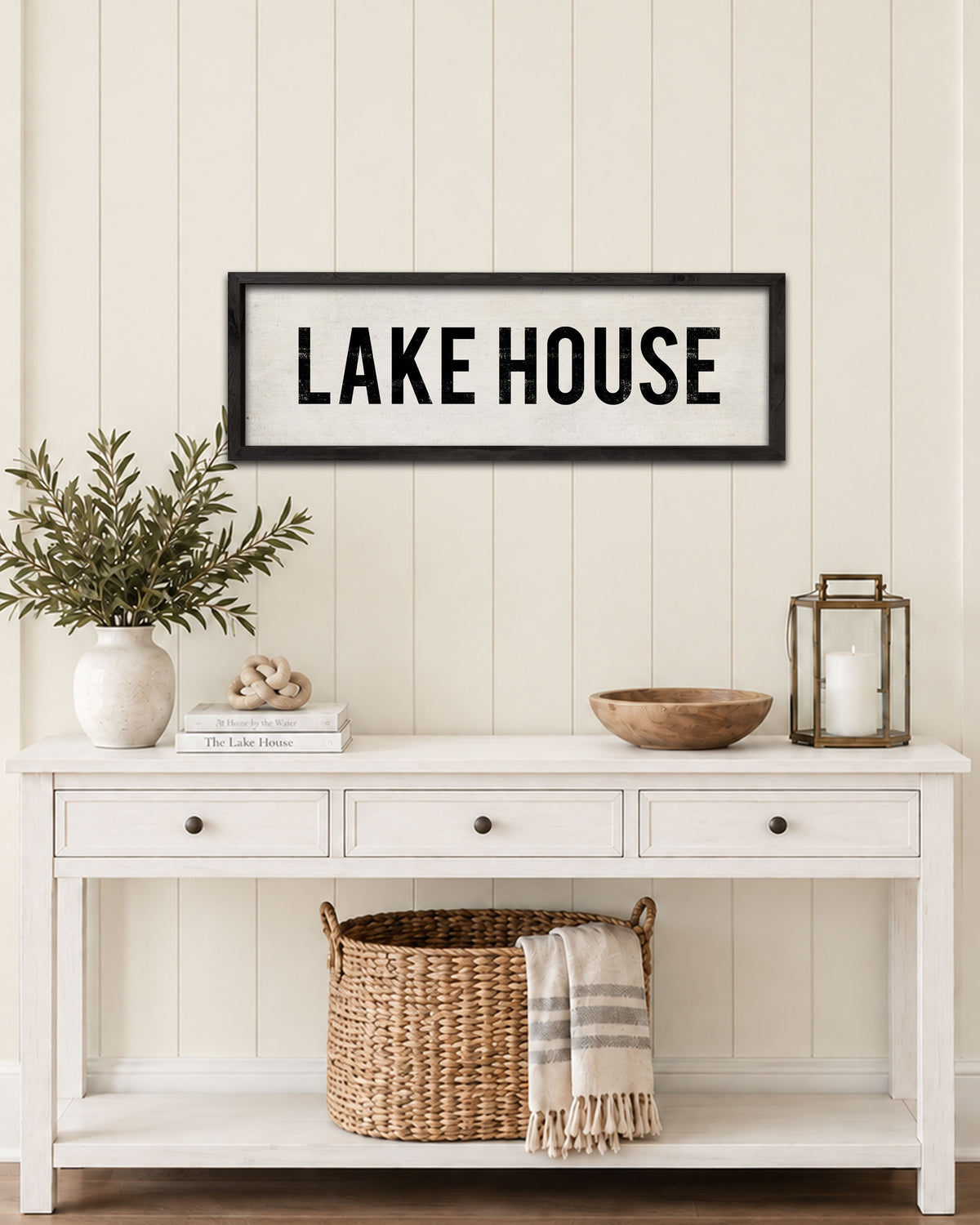 Hand-painted Lake House Sign with black frame in entryway