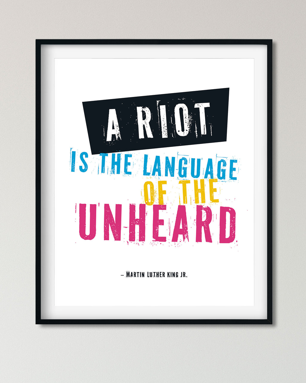 “A Riot Is the Language of the Unheard” MLK protest poster in black frame