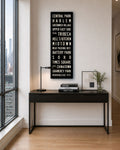 New York Subway Sign Canvas Art hanging in an apartment