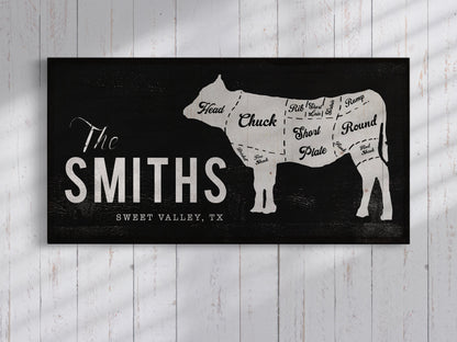 Personalized Family Name Sign with Cow in black hanging on wood wall - Transit Design