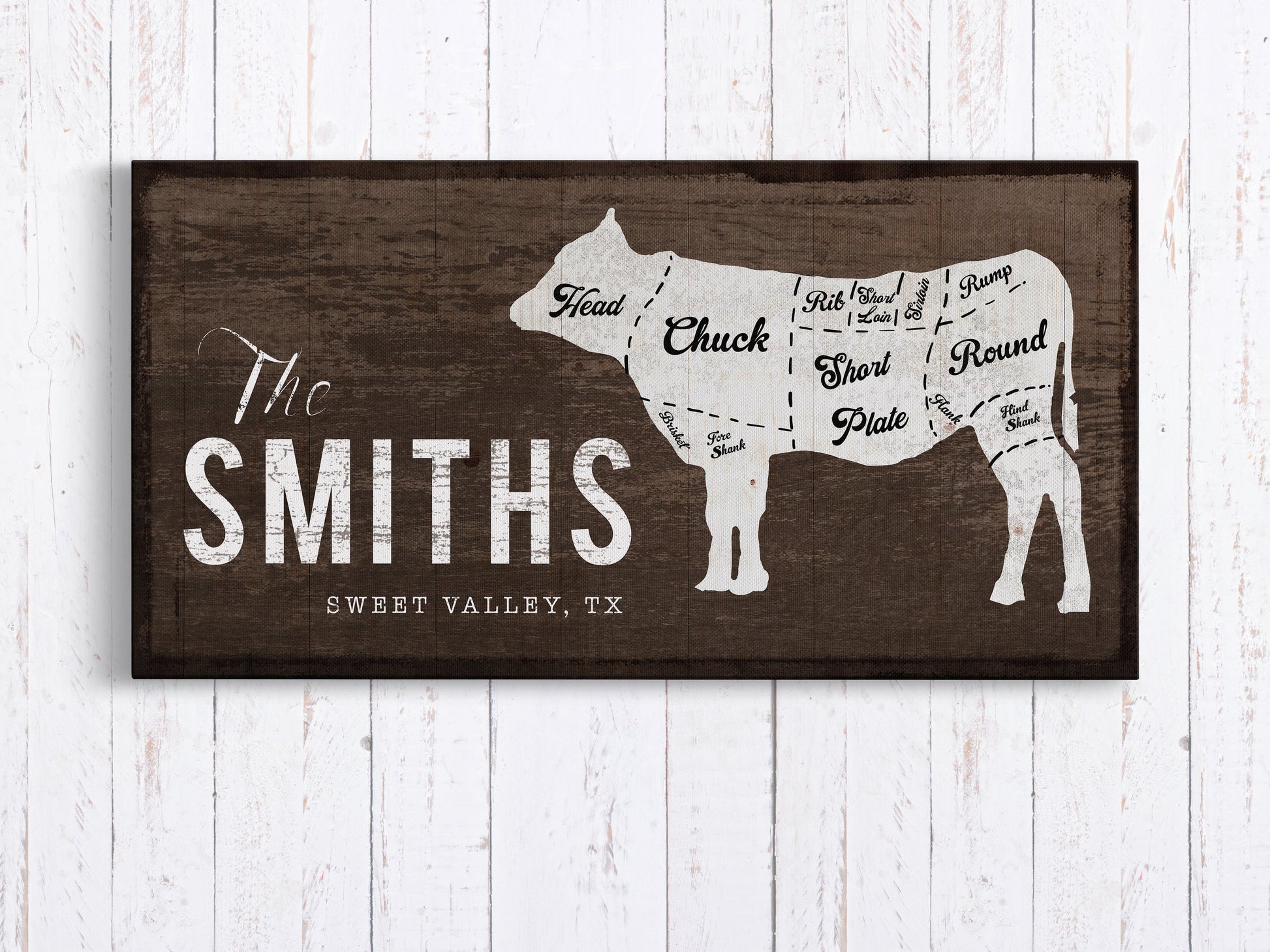 Personalized Family Name Sign with Cow in brown hanging on wood wall - Transit Design