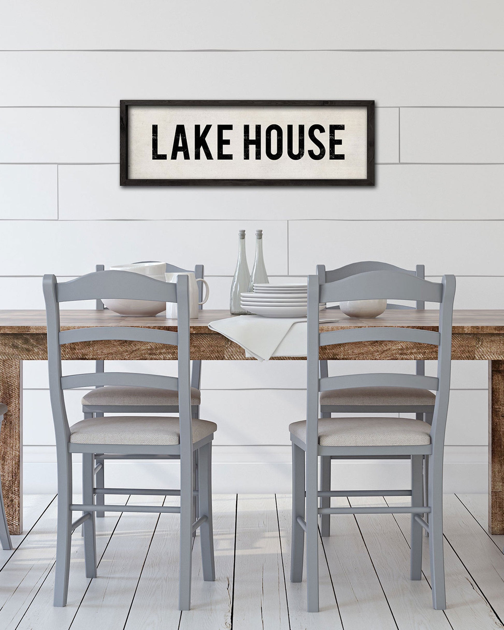 Vintage Wood Lake House Sign hanging in a dining room - Transit Design
